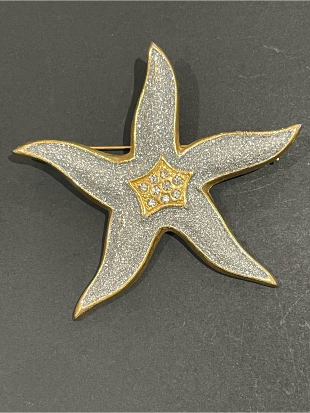 Gold-Trim Silver Starfish Brooch with Crystal Accent